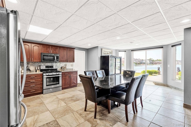 4303 S Lake Ln, Shelby Twp, MI 48316 - dining space with recessed lighting and baseboards