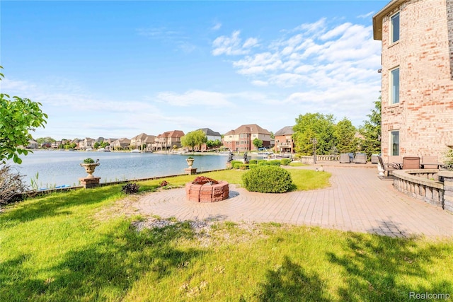4303 S Lake Ln, Shelby Twp, MI 48316 - view of yard with a residential view, a water view, and a patio