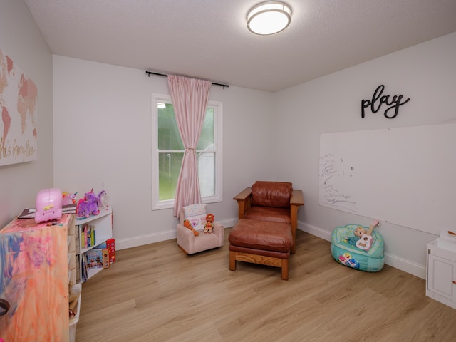 3002 Applelane Ave, Kalamazoo, MI 49008 - sitting room with wood finished floors and baseboards