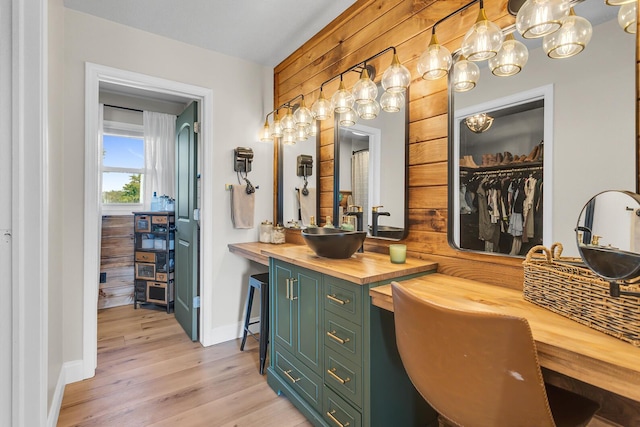 13451 S Waldron Rd, Waldron, MI 49288 - full bathroom featuring wood finished floors, vanity, a walk in closet, and a chandelier