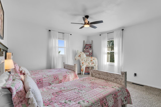 13451 S Waldron Rd, Waldron, MI 49288 - carpeted bedroom with ceiling fan and baseboards