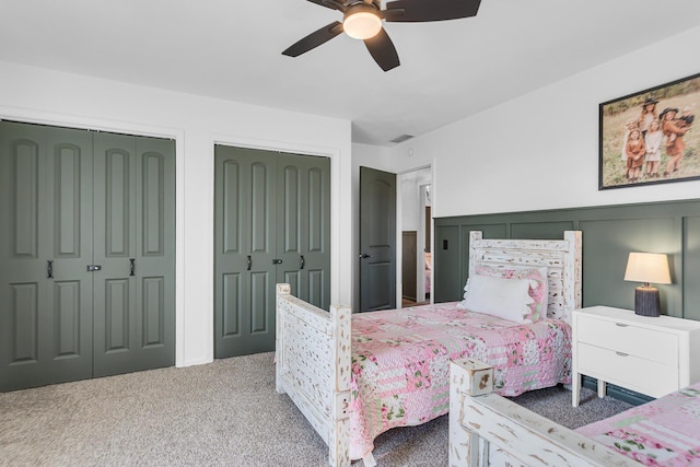 13451 S Waldron Rd, Waldron, MI 49288 - carpeted bedroom with multiple closets and ceiling fan