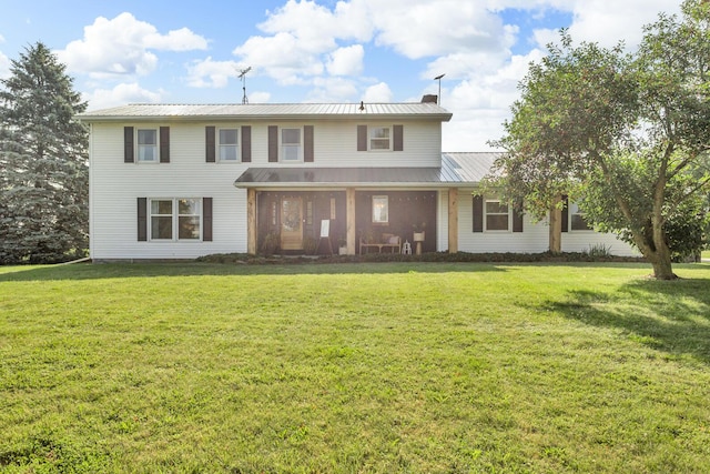 13451 S Waldron Rd, Waldron, MI 49288 - back of house featuring a yard and a metal roof
