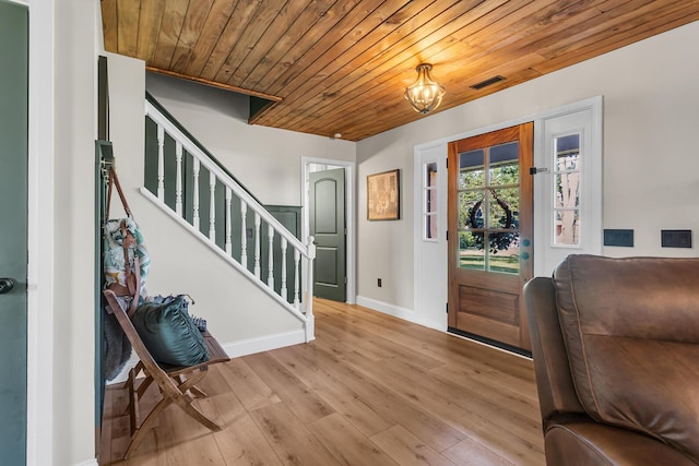 13451 S Waldron Rd, Waldron, MI 49288 - foyer featuring wooden ceiling, stairway, and hardwood / wood-style floors