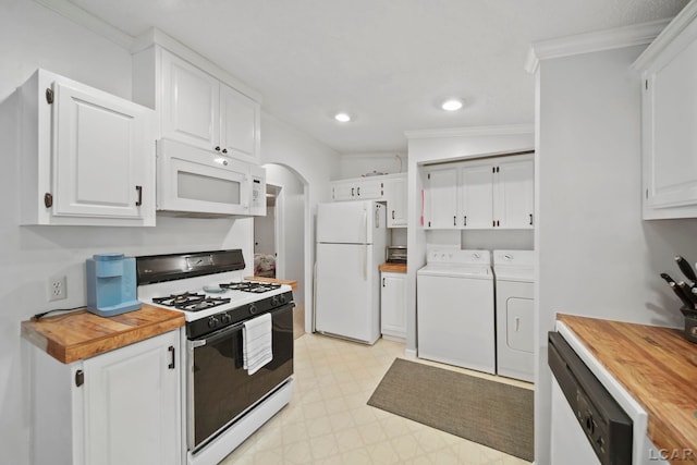 5390 Parkwood Ct, Manitou Beach, MI 49253 - kitchen with white appliances, independent washer and dryer, butcher block counters, light floors, and ornamental molding