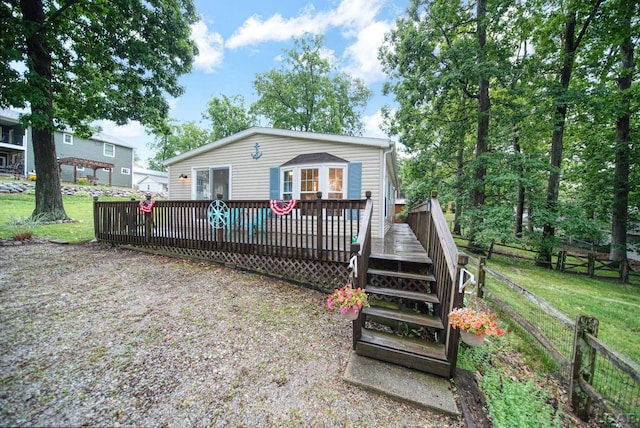 5390 Parkwood Ct, Manitou Beach, MI 49253 - view of front facade featuring a deck