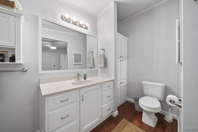 5390 Parkwood Ct, Manitou Beach, MI 49253 - bathroom with vanity, wood finished floors, and ceiling fan