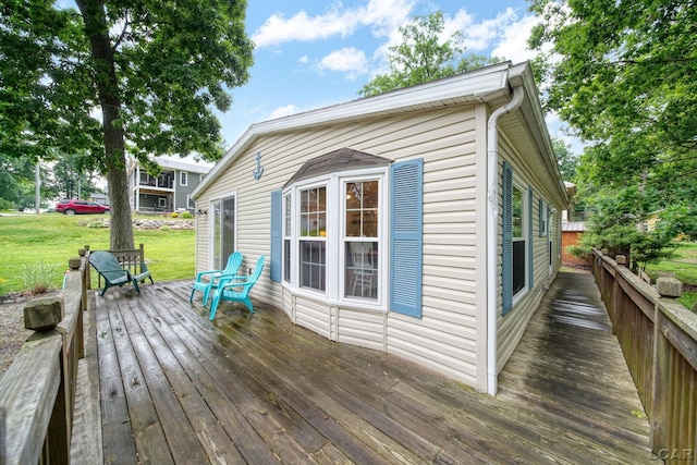 5390 Parkwood Ct, Manitou Beach, MI 49253 - deck featuring a yard