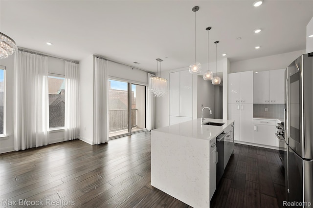 438 Selden St Unit 401, Detroit, MI 48201 - kitchen featuring smart refrigerator, white cabinetry, modern cabinets, recessed lighting, and pendant lighting