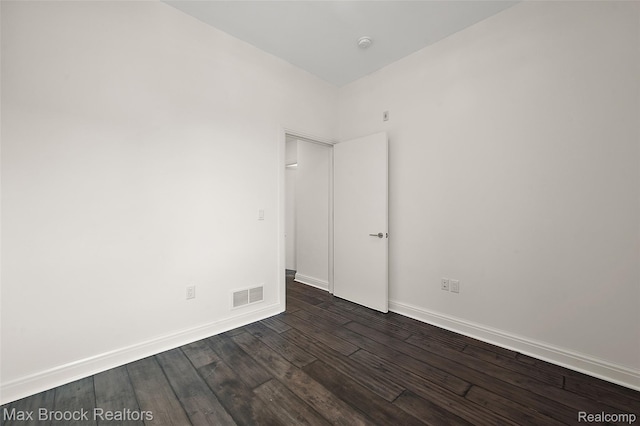 438 Selden St Unit 401, Detroit, MI 48201 - unfurnished room with dark wood finished floors and a smoke detector