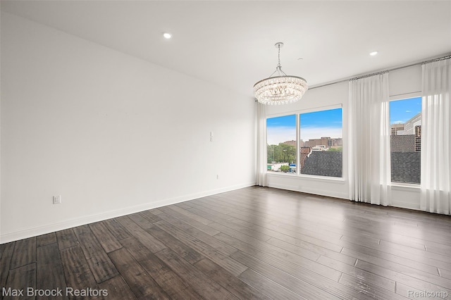 438 Selden St Unit 401, Detroit, MI 48201 - unfurnished room featuring a chandelier, dark wood finished floors, and recessed lighting