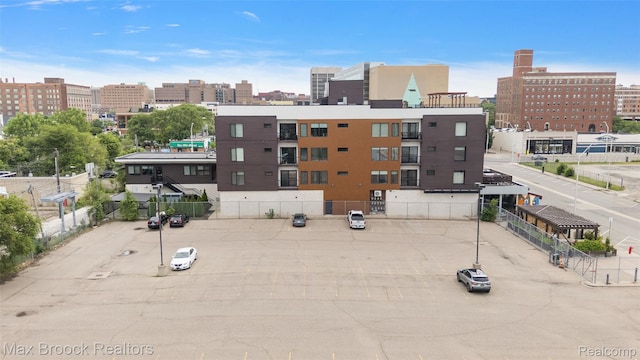 438 Selden St Unit 401, Detroit, MI 48201 - view of building exterior with uncovered parking and a view of city