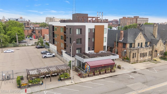 438 Selden St Unit 401, Detroit, MI 48201 - view of building exterior featuring uncovered parking and a view of city