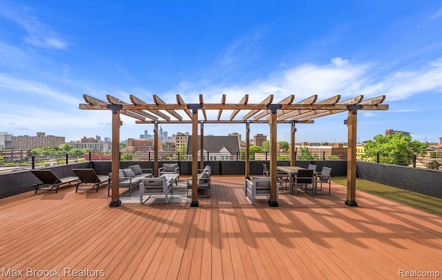 438 Selden St Unit 401, Detroit, MI 48201 - wooden deck with a pergola, an outdoor hangout area, and a city view