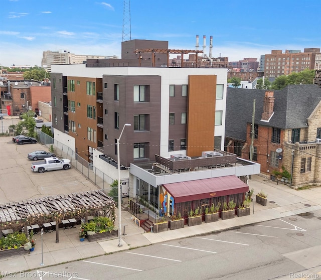 438 Selden St Unit 401, Detroit, MI 48201 - view of property with uncovered parking and a view of city