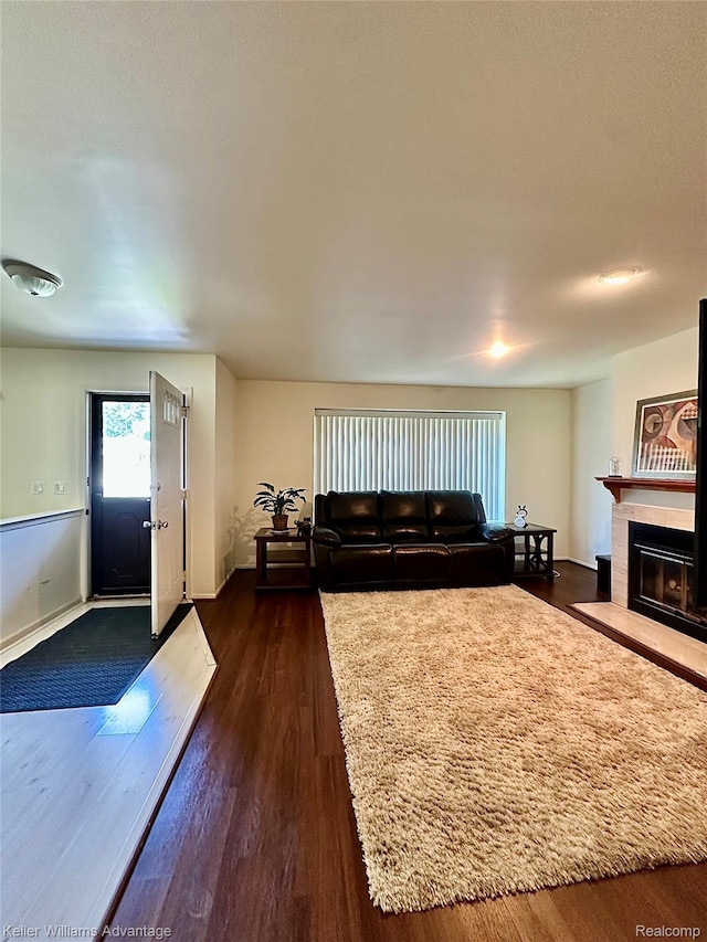 31441 Orchard Brook Ct, Farmington Hills, MI 48336 - living room featuring dark wood finished floors and a fireplace with flush hearth