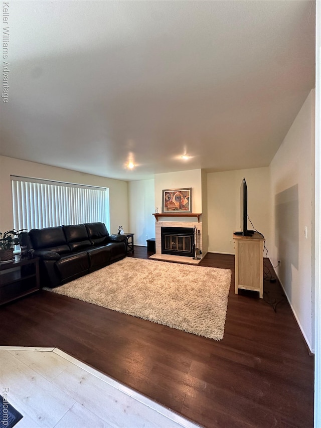 31441 Orchard Brook Ct, Farmington Hills, MI 48336 - living area featuring dark wood-style flooring and a glass covered fireplace