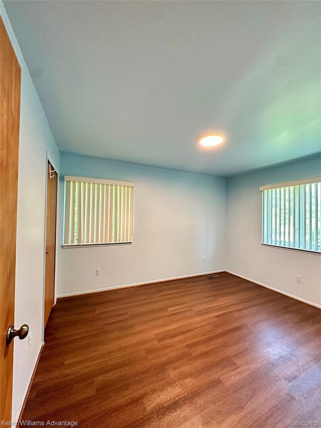 31441 Orchard Brook Ct, Farmington Hills, MI 48336 - unfurnished room with wood finished floors and baseboards