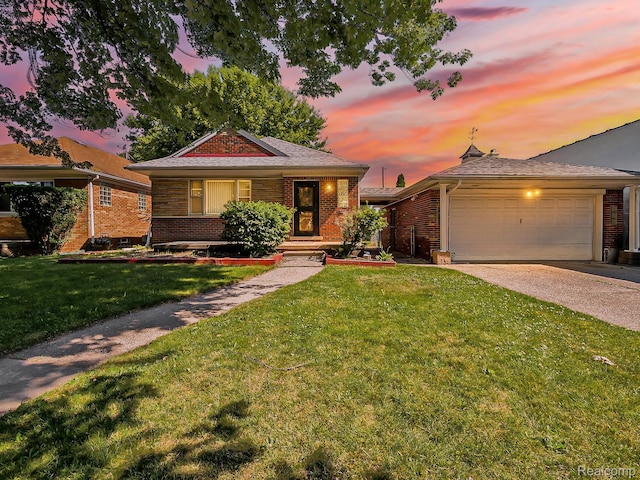 16039 Fordham St, Detroit, MI 48205 - view of front of home featuring brick siding, concrete driveway, a yard, and an attached garage