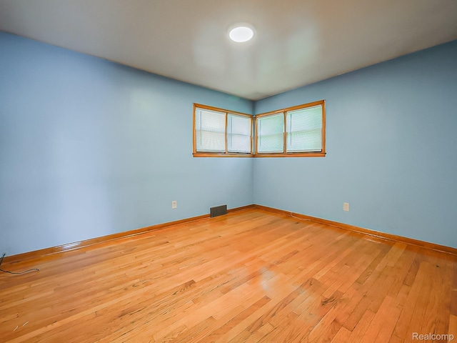 16039 Fordham St, Detroit, MI 48205 - unfurnished room with hardwood / wood-style flooring and baseboards