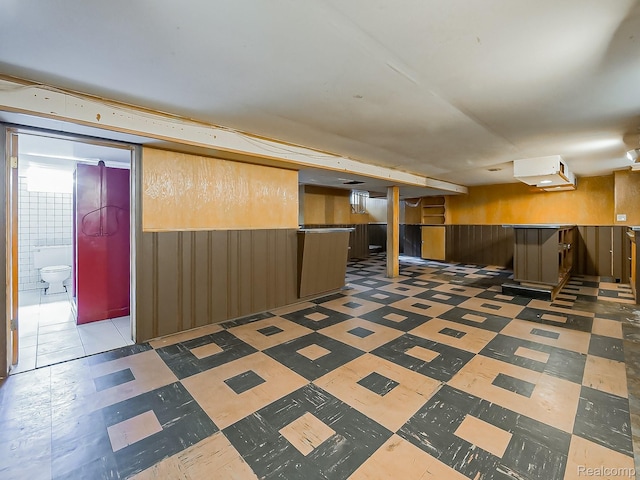 16039 Fordham St, Detroit, MI 48205 - finished below grade area featuring tile patterned floors, wooden walls, and wainscoting