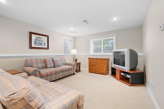 3229 Nighthawk Ln, Battle Creek, MI 49015 - living room featuring light colored carpet and recessed lighting