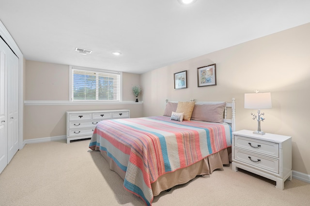 3229 Nighthawk Ln, Battle Creek, MI 49015 - bedroom with light carpet, a closet, and recessed lighting