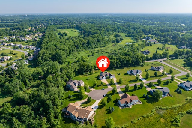 3229 Nighthawk Ln, Battle Creek, MI 49015 - aerial view of property and surrounding area featuring a forest