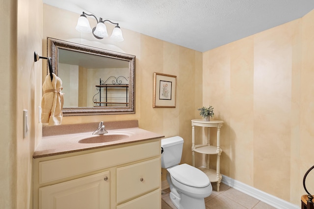 3229 Nighthawk Ln, Battle Creek, MI 49015 - bathroom with tile patterned flooring, vanity, and a textured ceiling