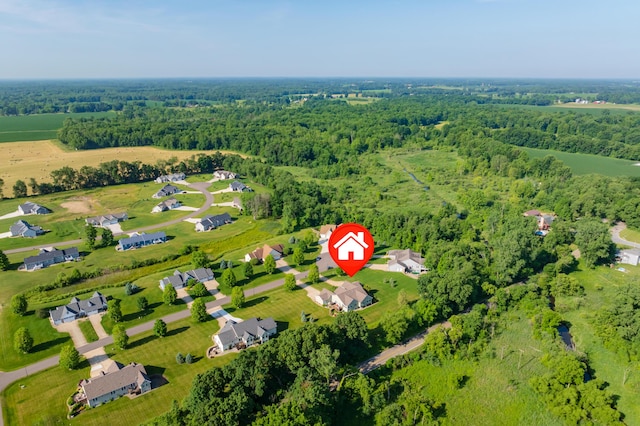 3229 Nighthawk Ln, Battle Creek, MI 49015 - aerial overview of property's location featuring a heavily wooded area