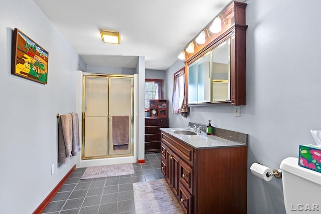1044 Michigan Ave, Adrian, MI 49221 - full bath with vanity, a shower stall, and tile patterned floors