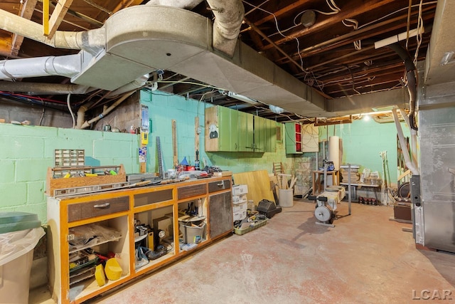 1044 Michigan Ave, Adrian, MI 49221 - unfinished basement with a workshop area