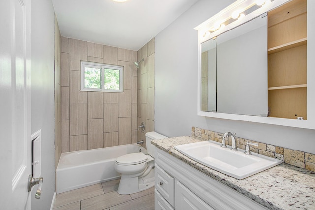 2375 Pontiac Trl, Ann Arbor, MI 48105 - full bath featuring vanity, shower / bath combination, and wood finished floors