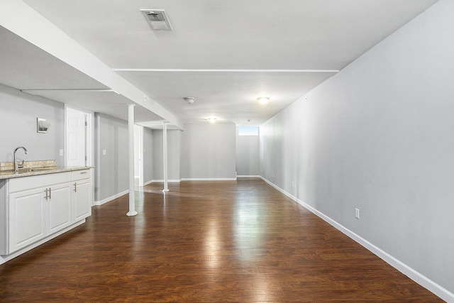 2375 Pontiac Trl, Ann Arbor, MI 48105 - unfurnished living room with wood finished floors and a sink