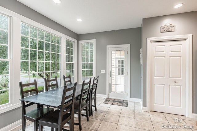 5264 Deverman Ct NE, Lowell, MI 49331 - dining area with light tile patterned floors and recessed lighting