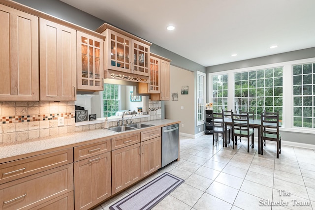 5264 Deverman Ct NE, Lowell, MI 49331 - kitchen with dishwasher, light countertops, backsplash, light tile patterned floors, and recessed lighting