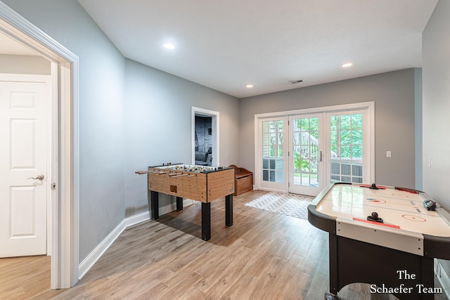 5264 Deverman Ct NE, Lowell, MI 49331 - playroom with light wood-style flooring and recessed lighting