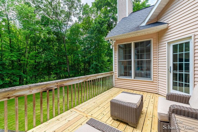5264 Deverman Ct NE, Lowell, MI 49331 - wooden deck featuring a yard