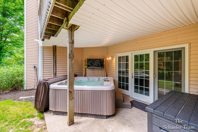 5264 Deverman Ct NE, Lowell, MI 49331 - view of patio / terrace with a hot tub