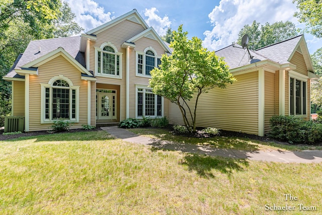 5264 Deverman Ct NE, Lowell, MI 49331 - view of front of home with a front lawn and roof with shingles