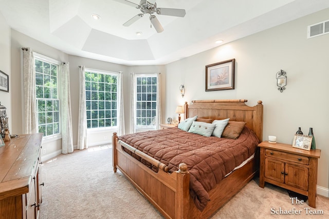 5264 Deverman Ct NE, Lowell, MI 49331 - bedroom with light colored carpet, a tray ceiling, ceiling fan, and recessed lighting