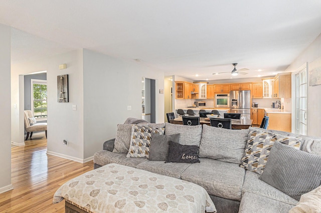 4166 Grandwood Cir, Saint Joseph, MI 49085 - living room featuring light wood-style flooring, a ceiling fan, and recessed lighting