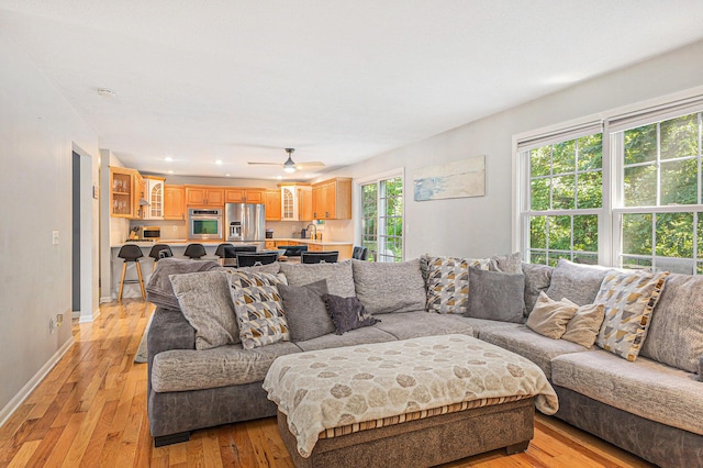 4166 Grandwood Cir, Saint Joseph, MI 49085 - living area featuring light wood finished floors, ceiling fan, and recessed lighting