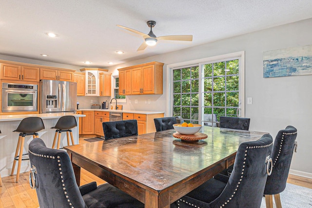 4166 Grandwood Cir, Saint Joseph, MI 49085 - dining room featuring light wood-style floors, ceiling fan, and recessed lighting