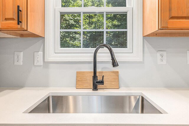 4166 Grandwood Cir, Saint Joseph, MI 49085 - kitchen view of a sink and light countertops