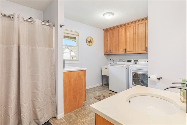 4166 Grandwood Cir, Saint Joseph, MI 49085 - laundry room featuring washer and clothes dryer and baseboards