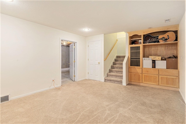 4166 Grandwood Cir, Saint Joseph, MI 49085 - finished basement featuring carpet flooring and stairway