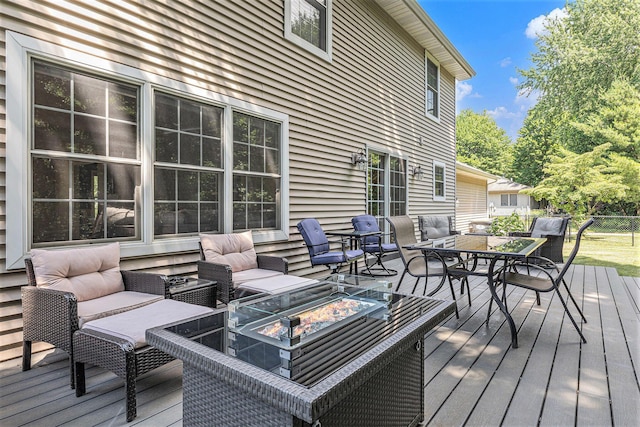 4166 Grandwood Cir, Saint Joseph, MI 49085 - deck with an outdoor living space with a fire pit and outdoor dining area