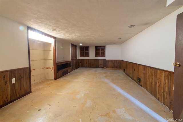 9892 Wheeler St, Van Buren, MI 48111 - finished below grade area featuring wainscoting and wooden walls
