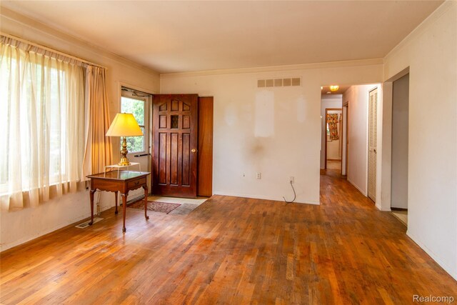 9892 Wheeler St, Van Buren, MI 48111 - unfurnished room featuring hardwood / wood-style flooring and ornamental molding